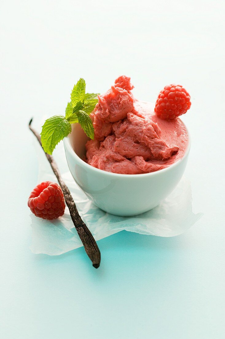 A bowl of raspberry and vanilla butter