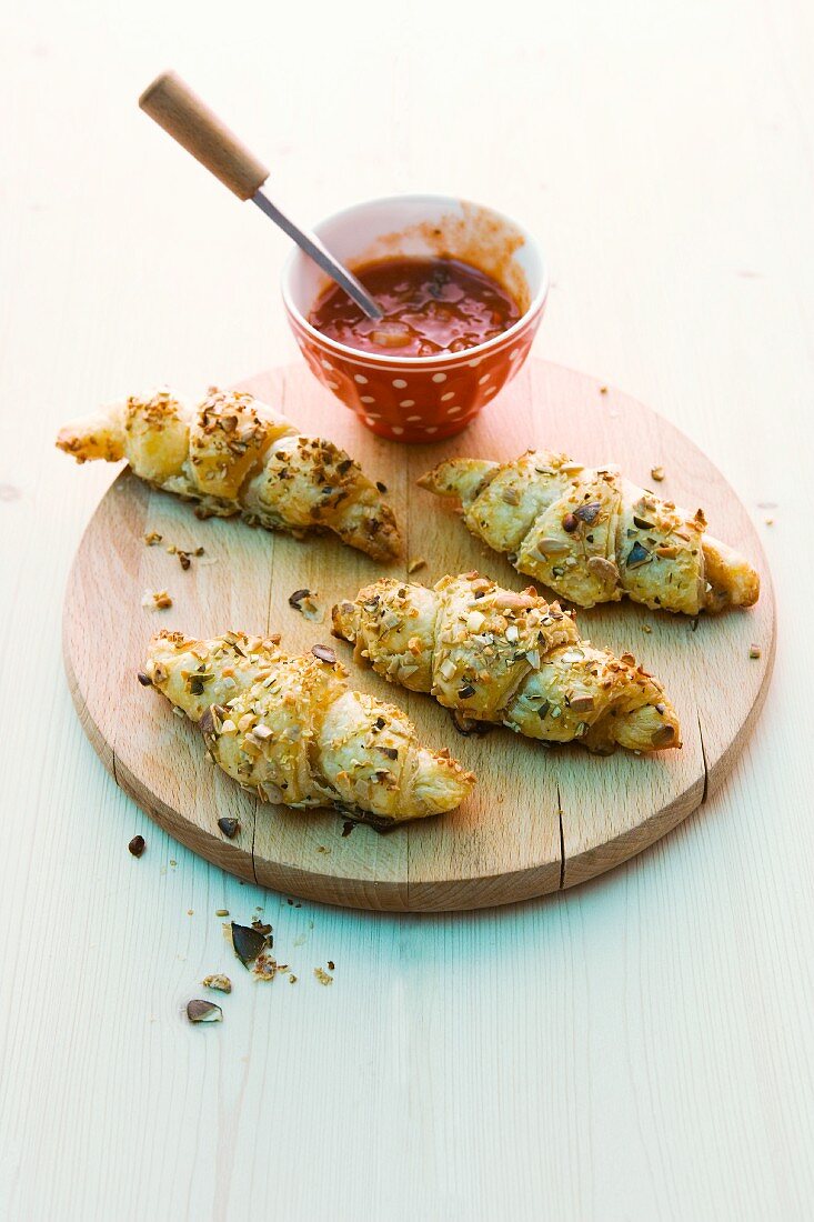 Herb croissants with a tomato dip