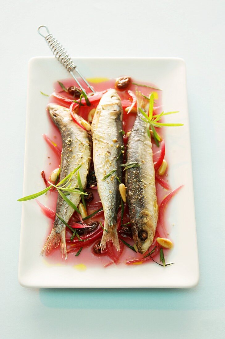 Backed sardines in vegetable broth