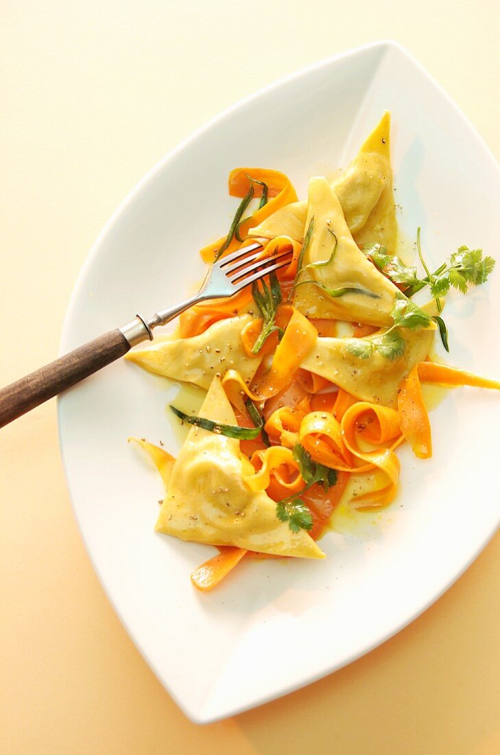 Rabbit-filled ravioli and grated carrot