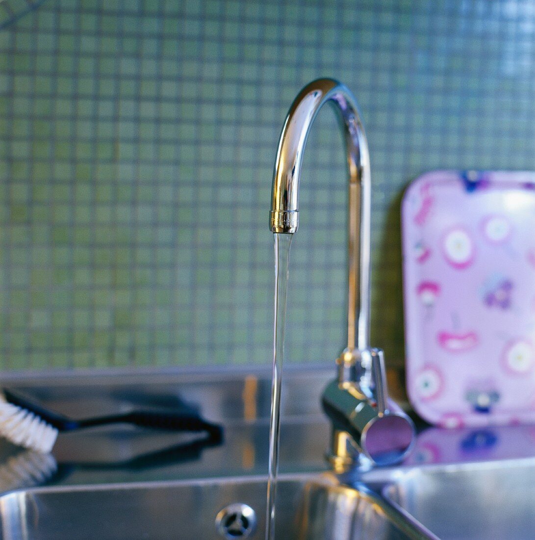 Water running into sink