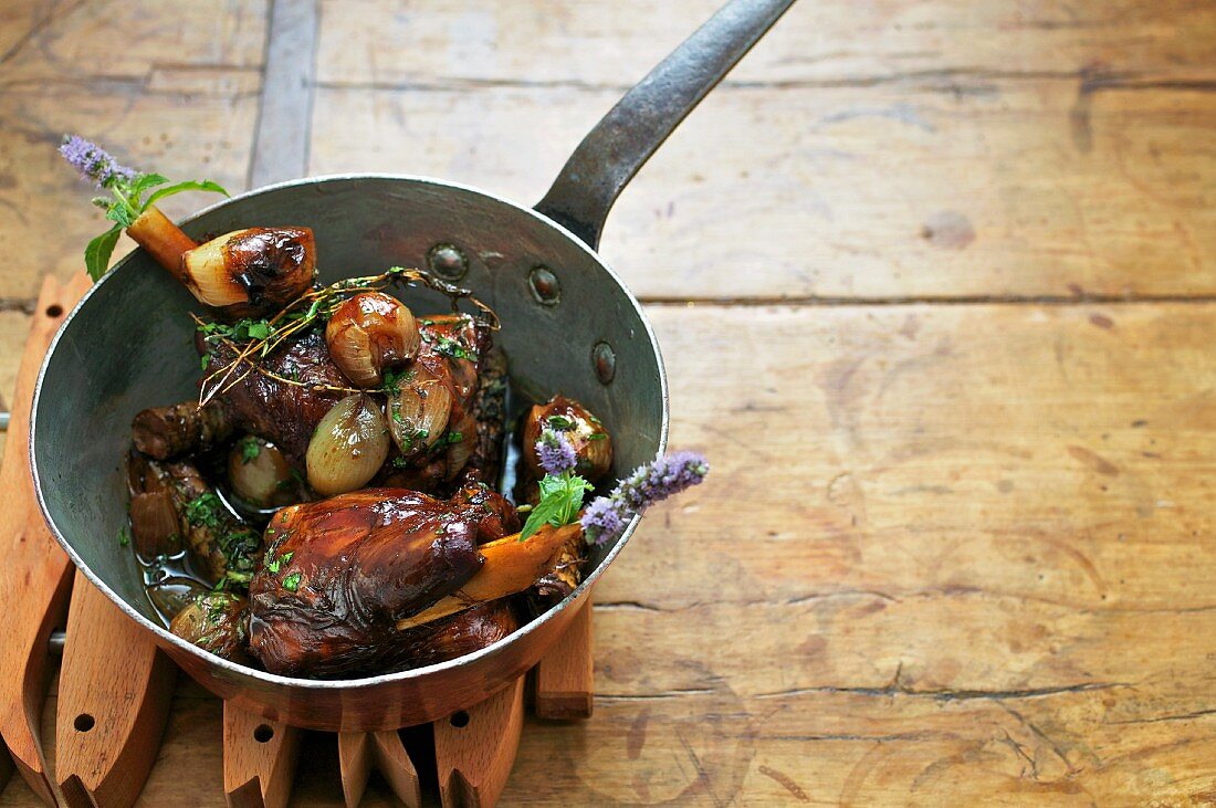 Braised leg of lamb with Jerusalem artichokes and herbs