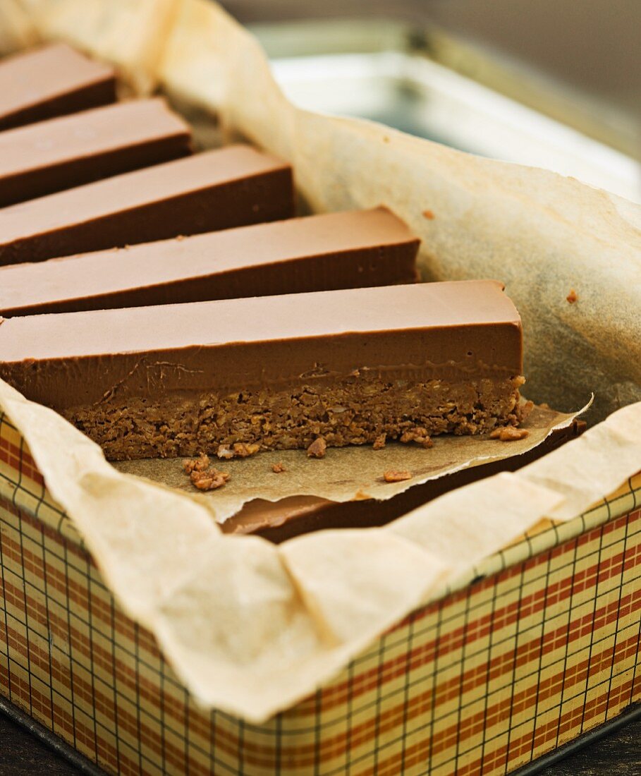 Coconut nougat bars in a storage tin