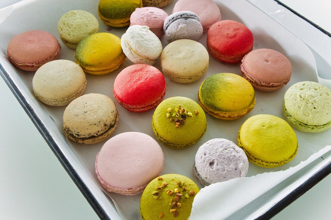 Various macaroons on a baking tray