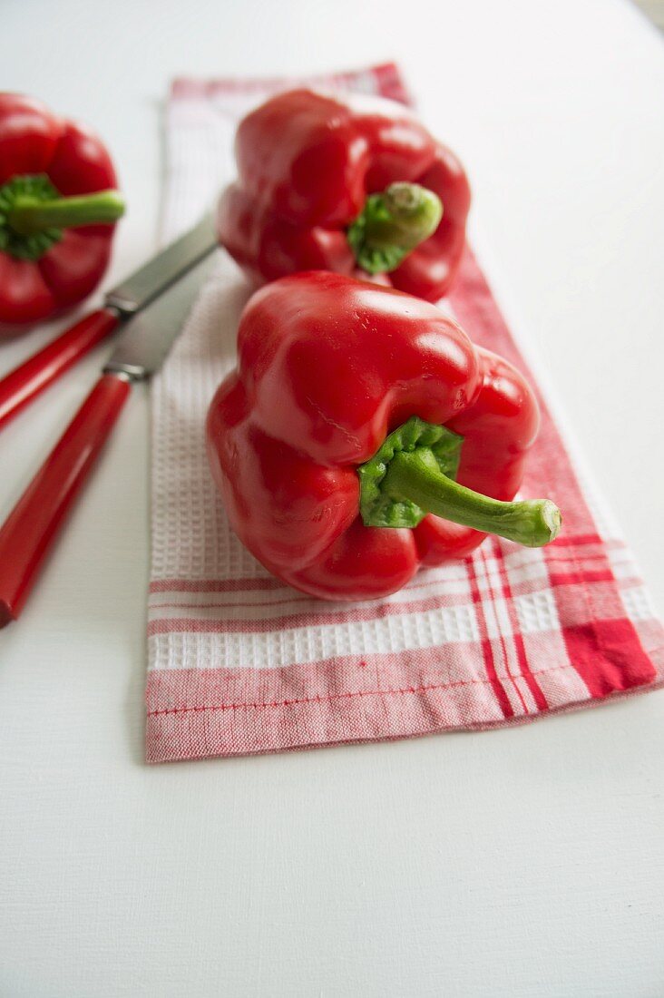 Red peppers on a tea towel
