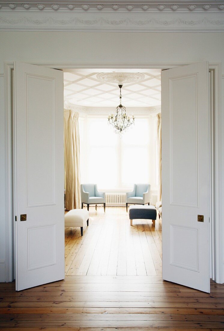 View of living room through open double doors