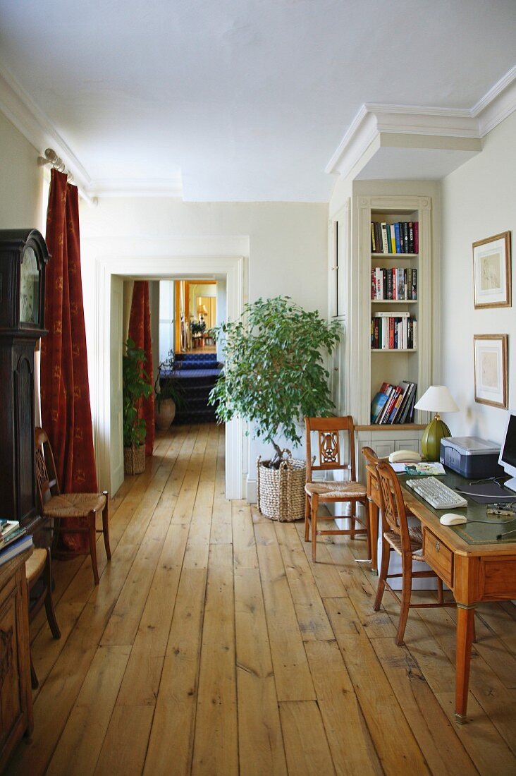 Office with modern equipment in English manor house