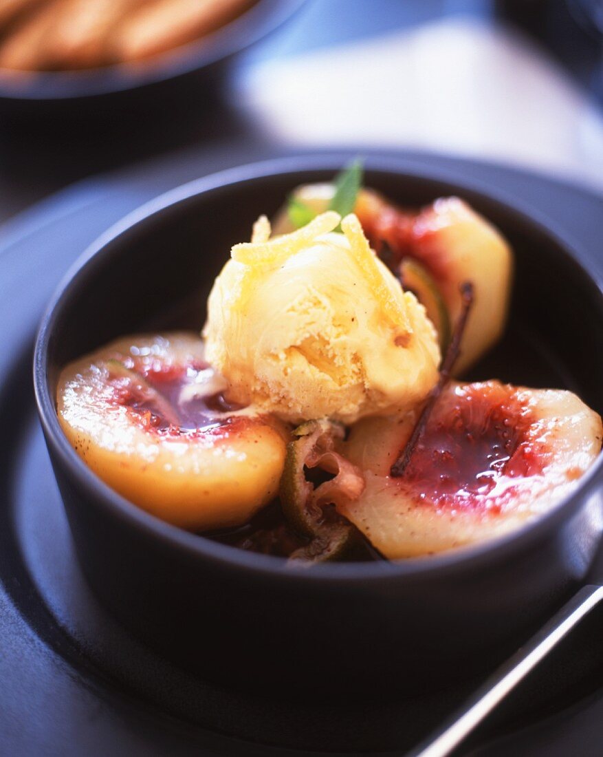 Poached peaches with vanilla ice cream