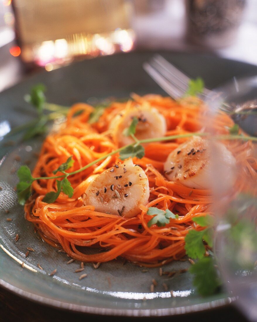 Scallops with caraway and grated carrot
