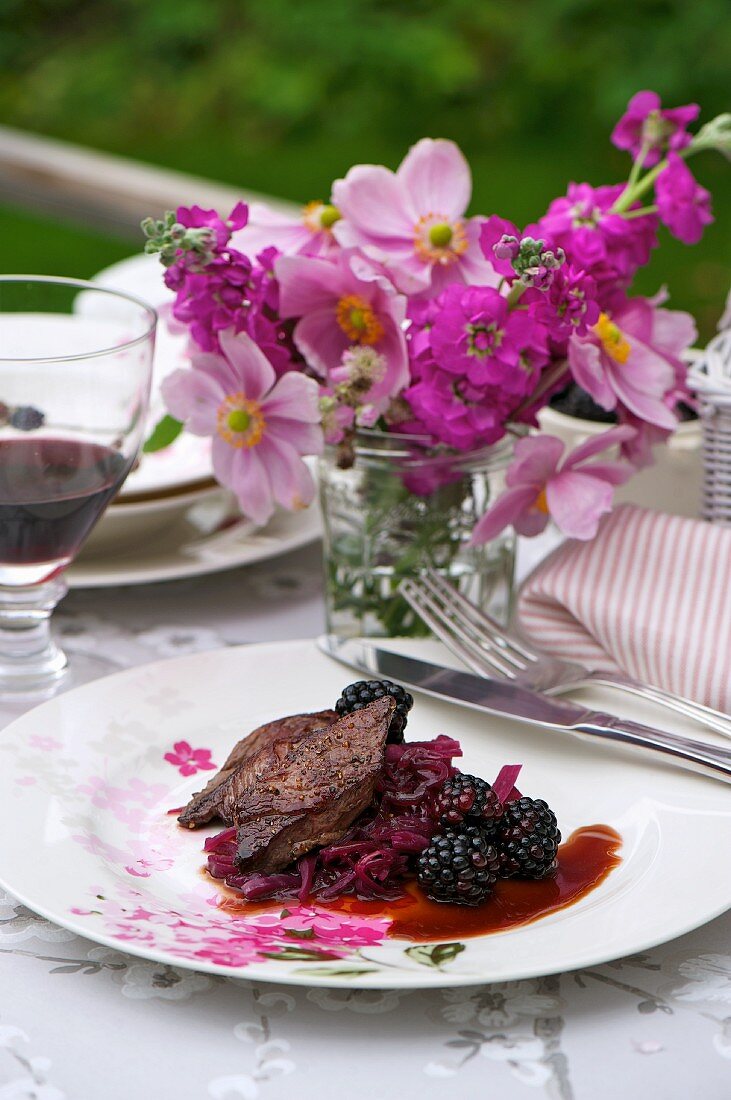 Venison with red cabbage and blackberries