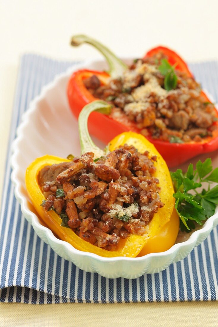 Peppers filled with minced meat, chanterelle mushrooms and buck wheat