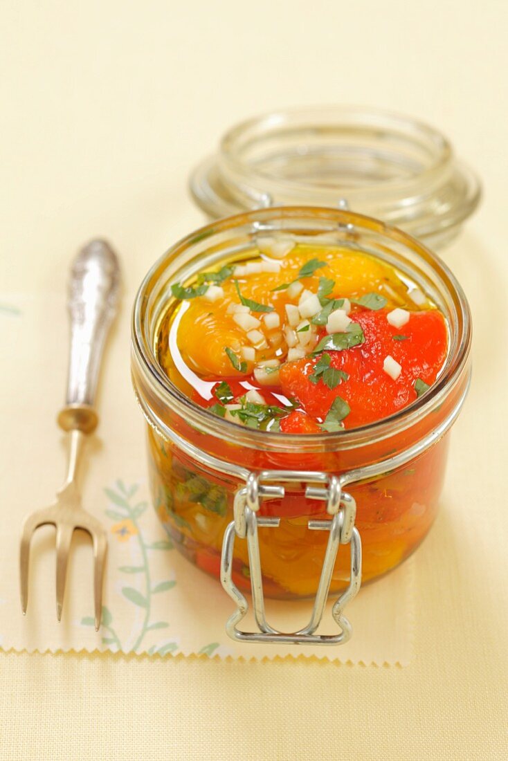 Preserved peppers with garlic and parsley