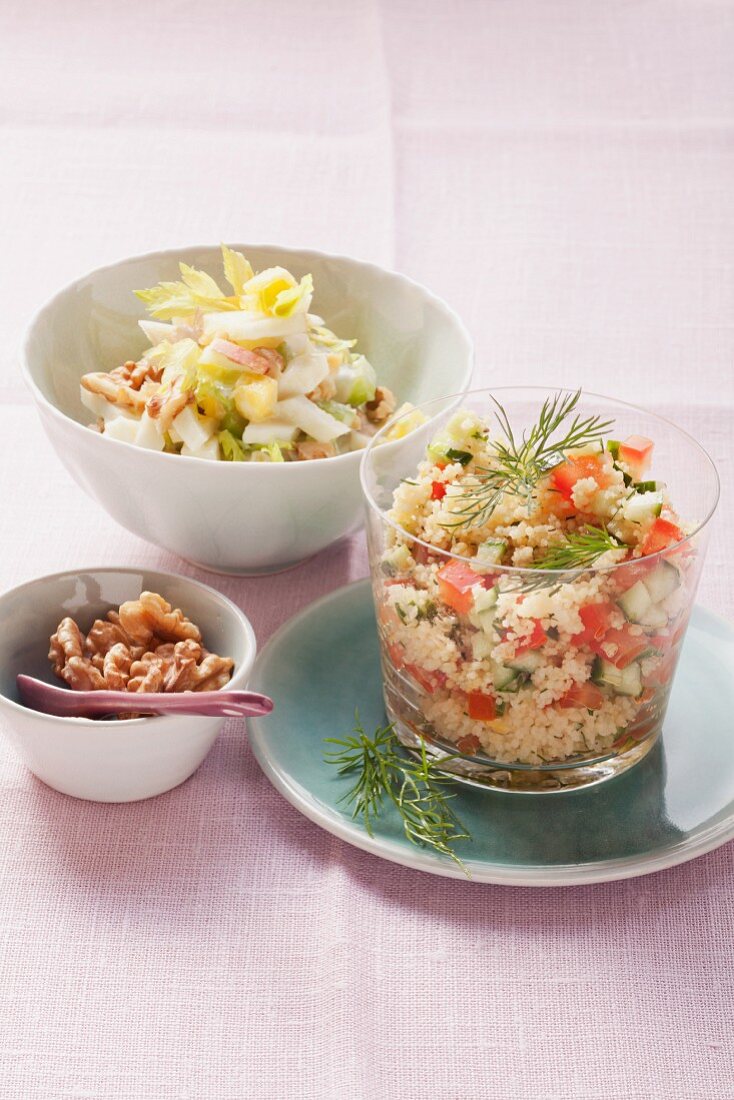 Fruity celery salad and couscous salad with vegetables