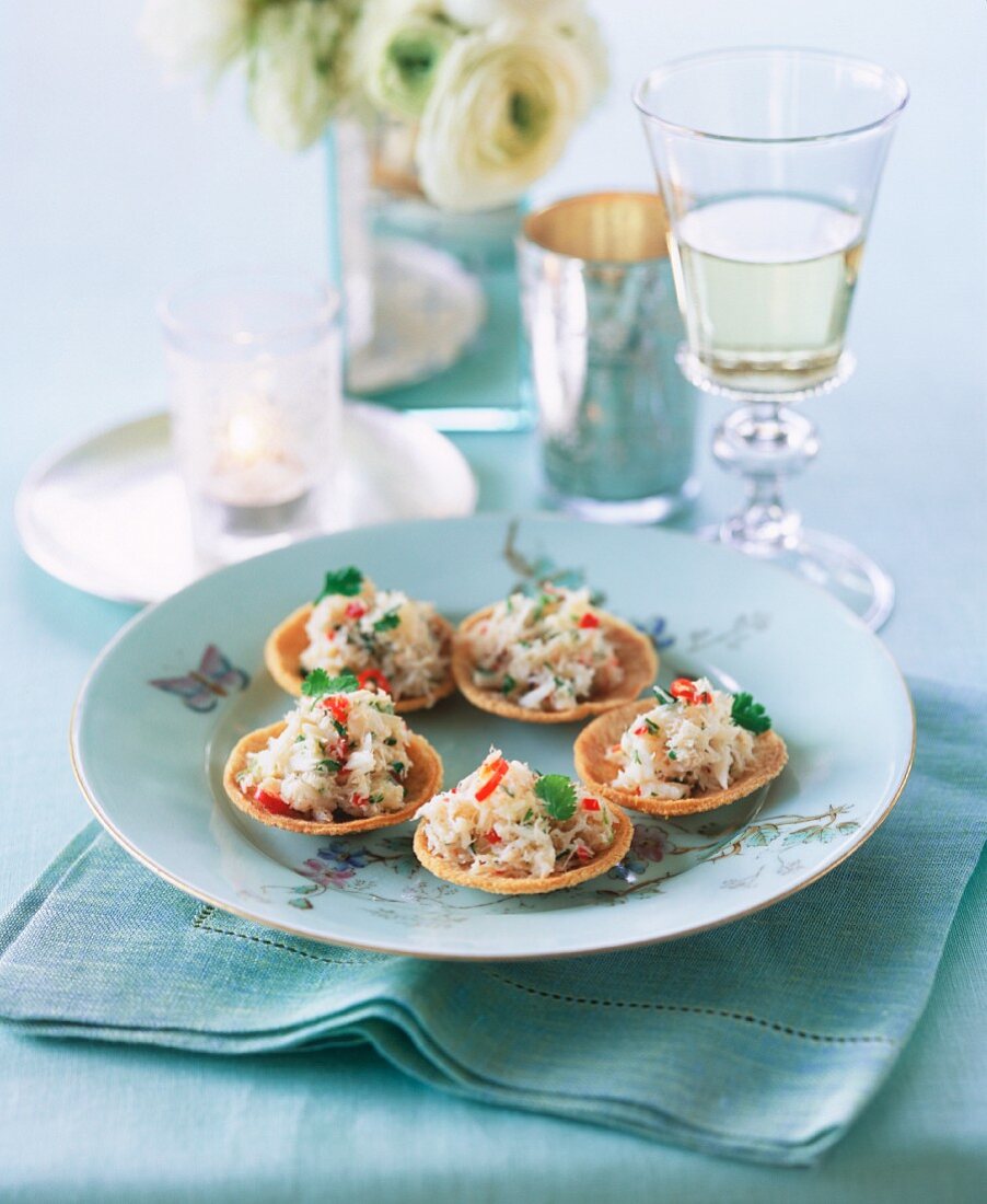 Crabmeat with coriander and chilli in crispy shells