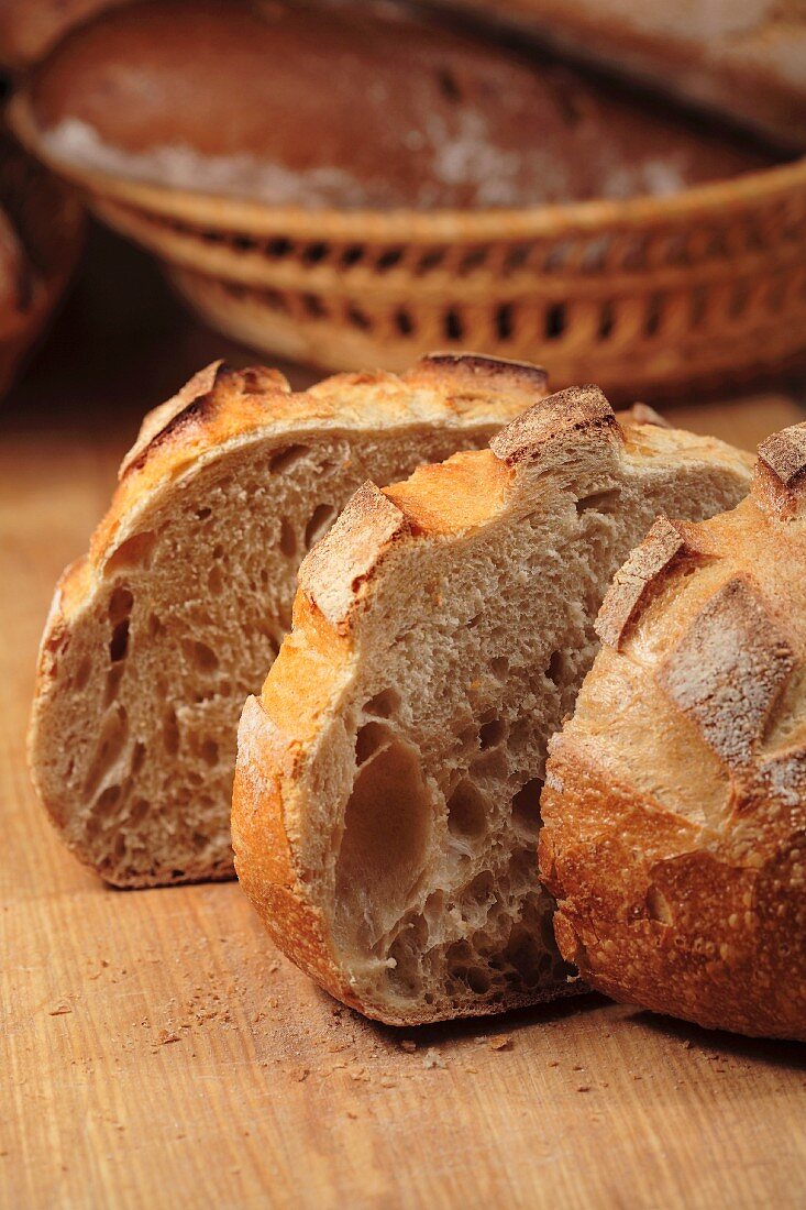 Sliced bread, bread basket in background