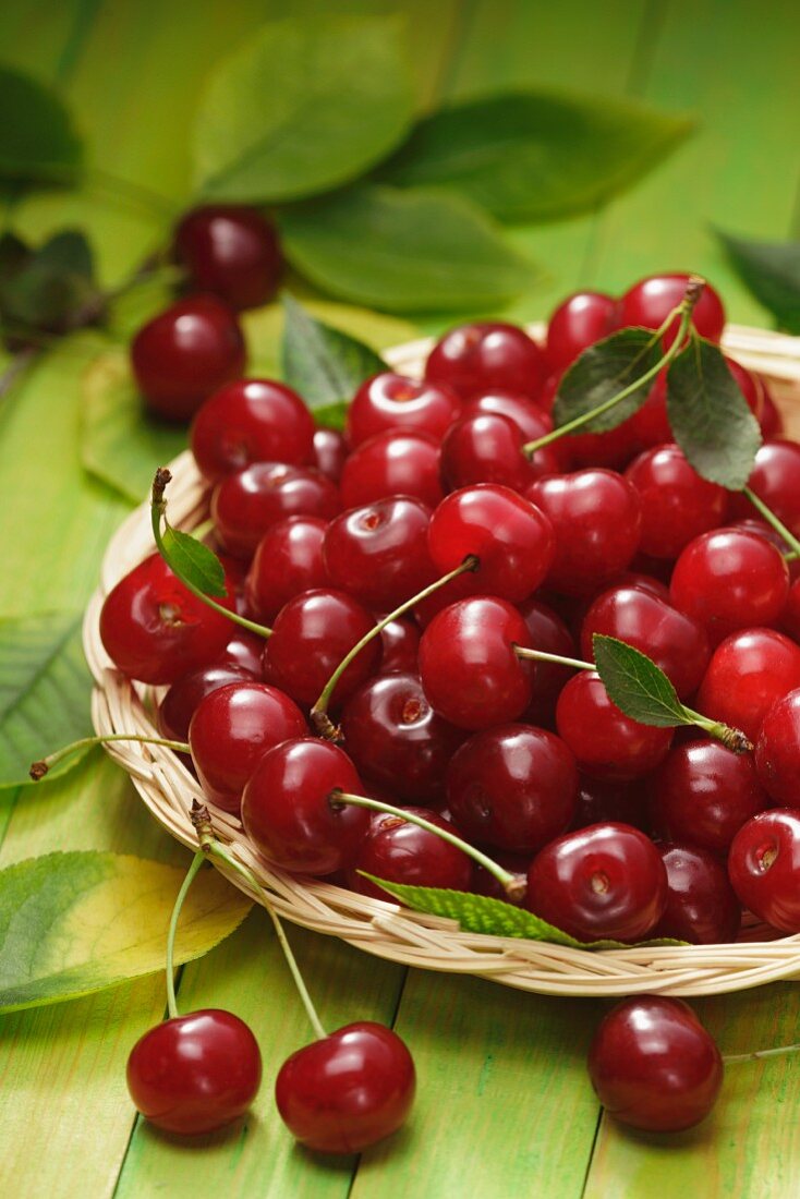 Sour cherries in a shallow basket