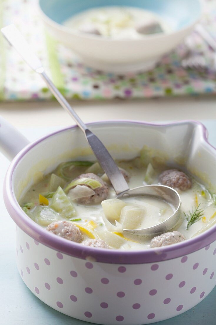 Creamy cucumber soup with sausage meatballs