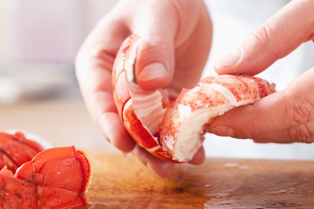 Removing lobster meat from the shell