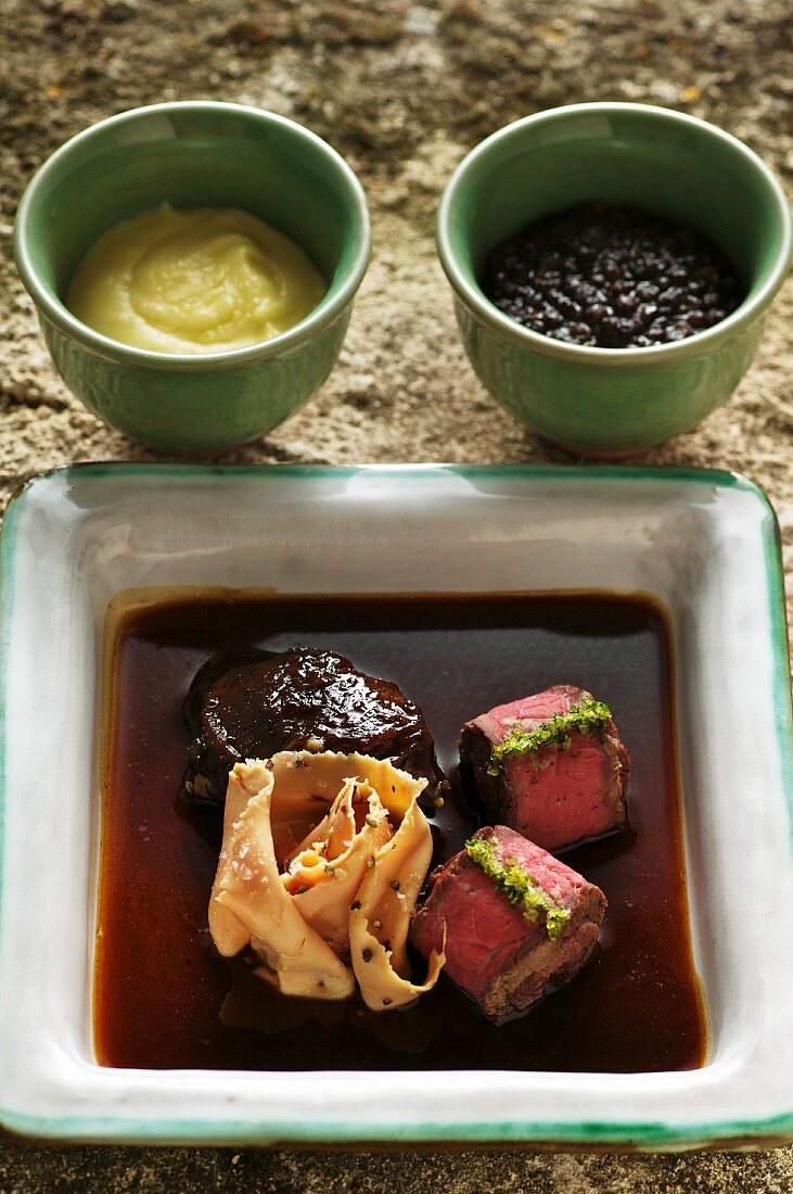 Beef fillet with braised beef cheek, raw dusk liver and lemon lentils