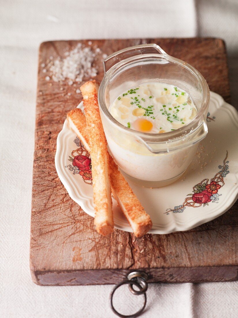 Oeuf Cocotte with bread sticks