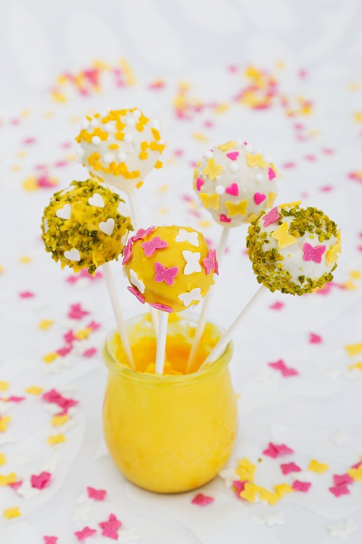 Cake pops decorated for spring (hearts, butterflies)