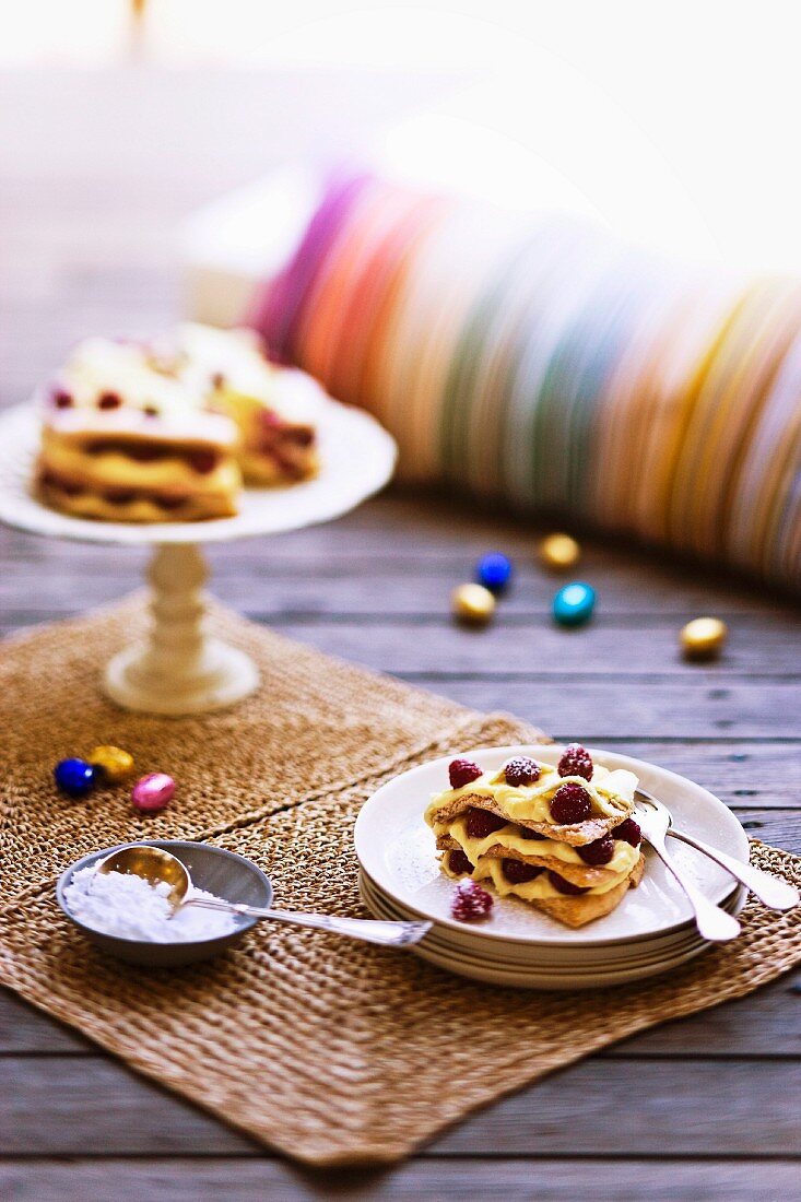 Easter cake with hazel nut meringue, raspberries and mascarpone
