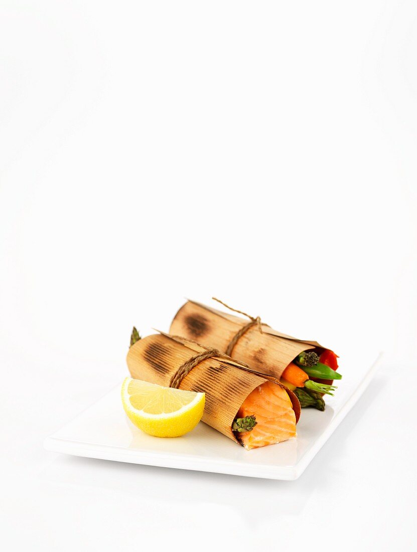 Salmon and vegetables in cederwood rolls