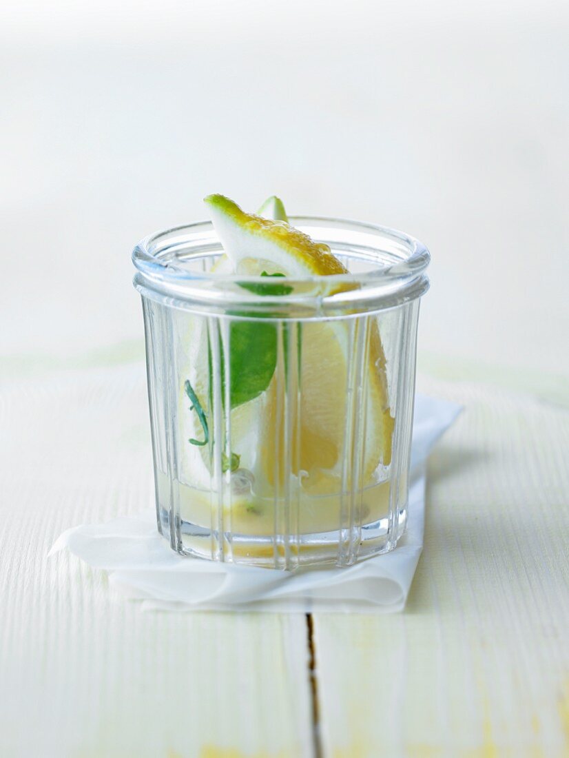 Lemon juice and lemon slice in a glass