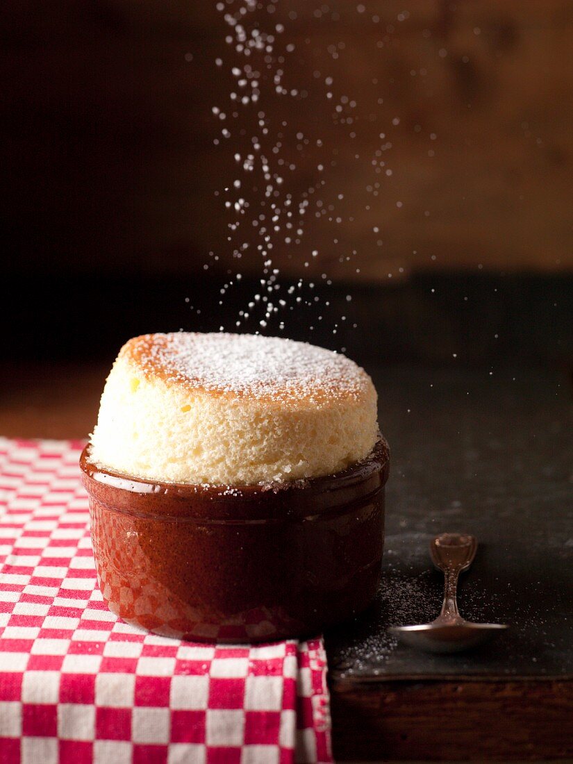 Sprinkling a souffle with sugar