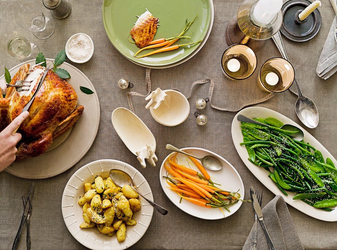Roast turkey stuffed with lemon grass and assorted side dishes