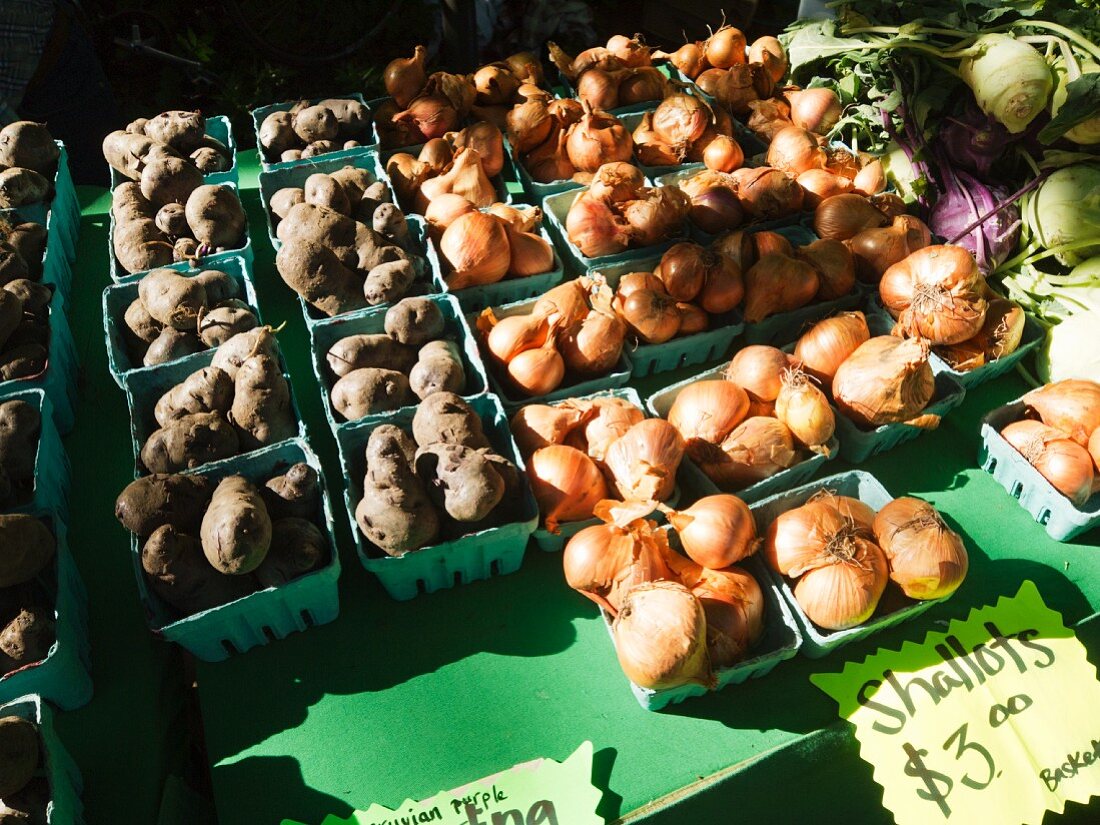 Potatoes and shallots at a market in Portland, Oregon