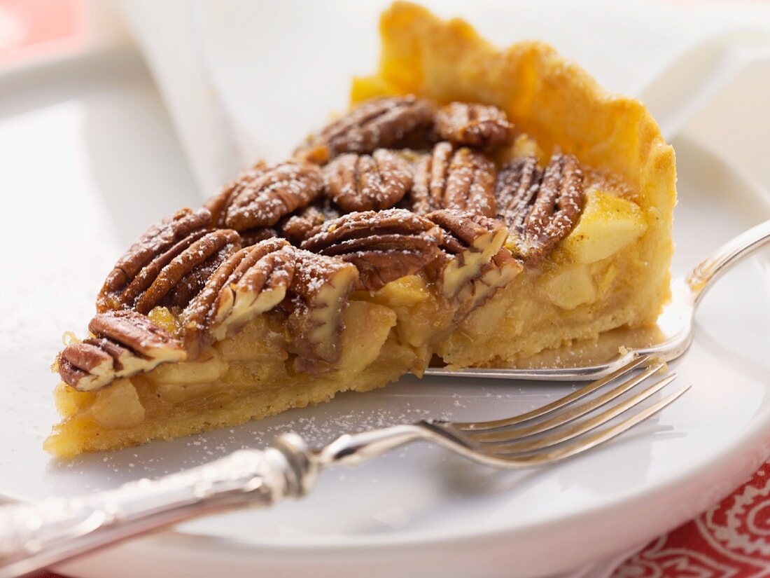 A slice of pecan and apple pie