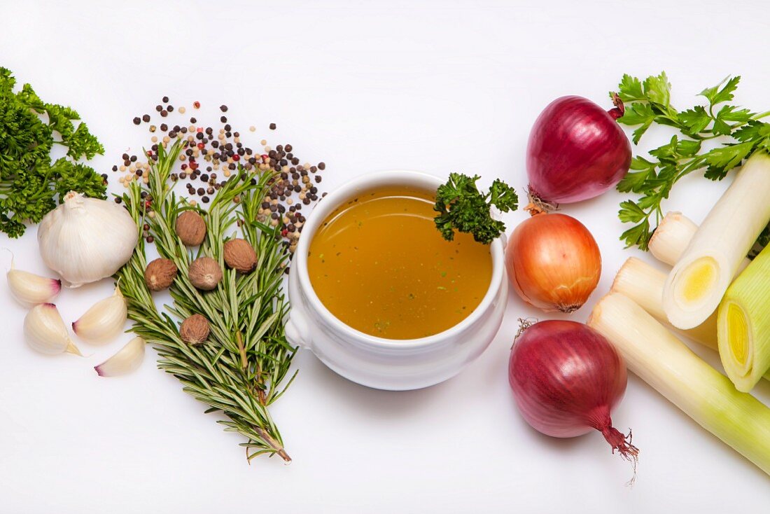 Soup bowl of vegetable stock and ingredients