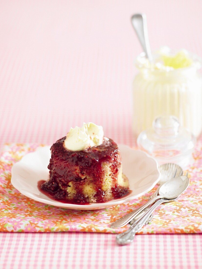Baked pudding with raspberry sauce