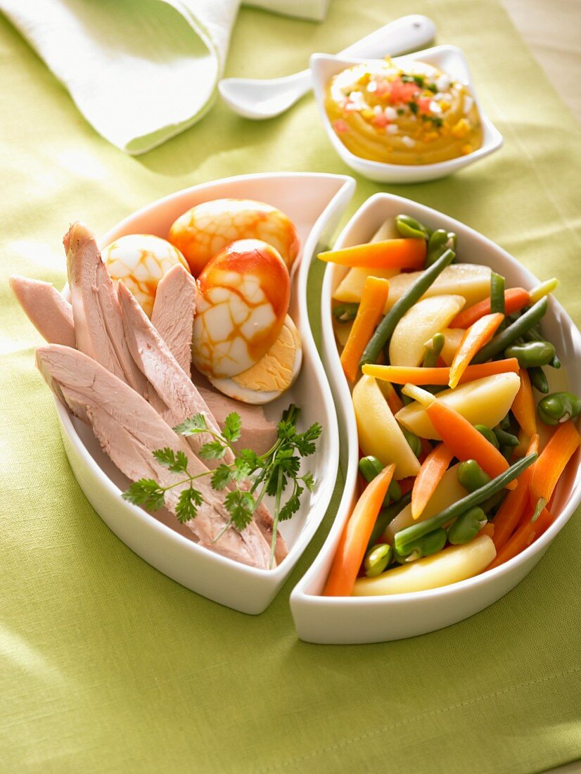 Chicken fillet with egg and spring vegetables