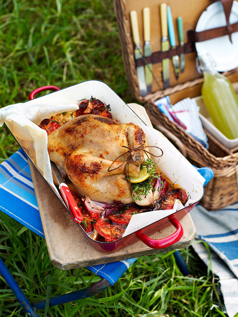 Roasted chicken with tomatoes and thyme for a picnic