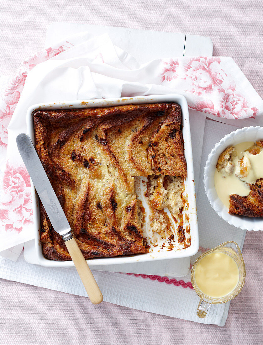 Bread and butter pudding with vanilla sauce (seen from above)