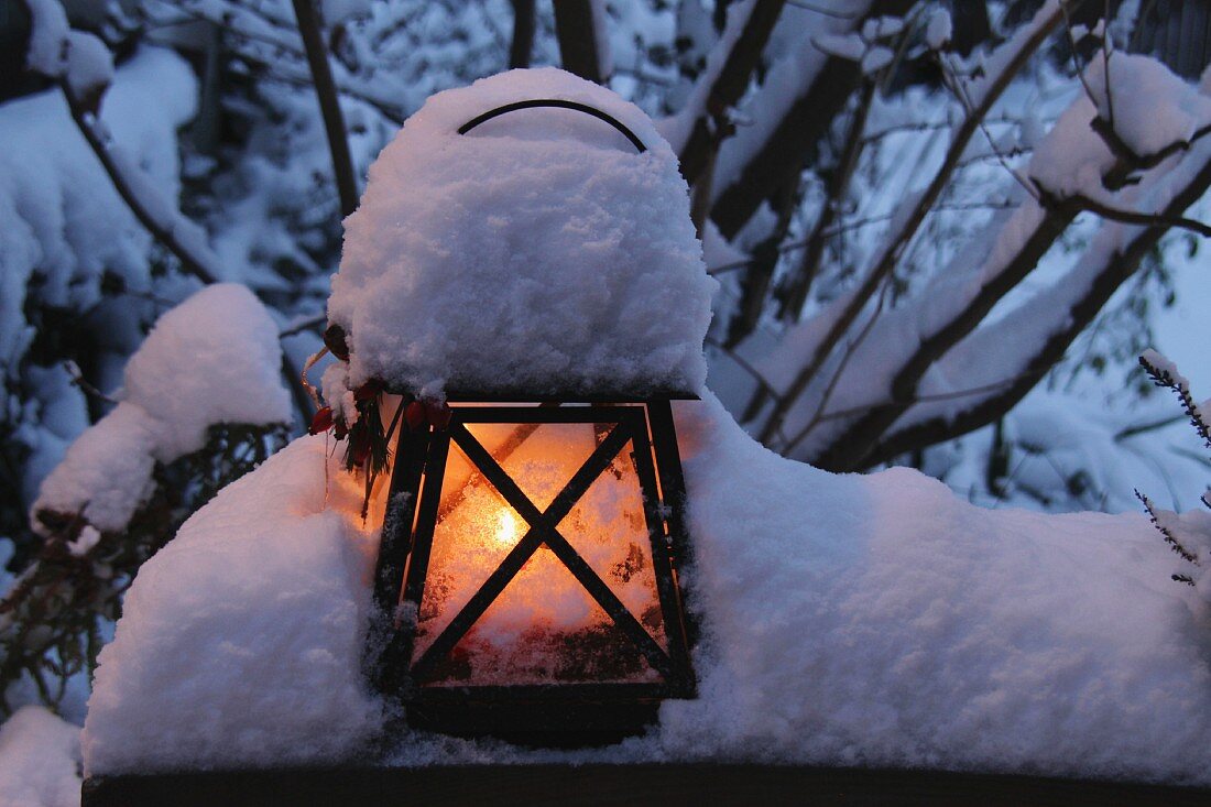 Lantern with a cap of snow