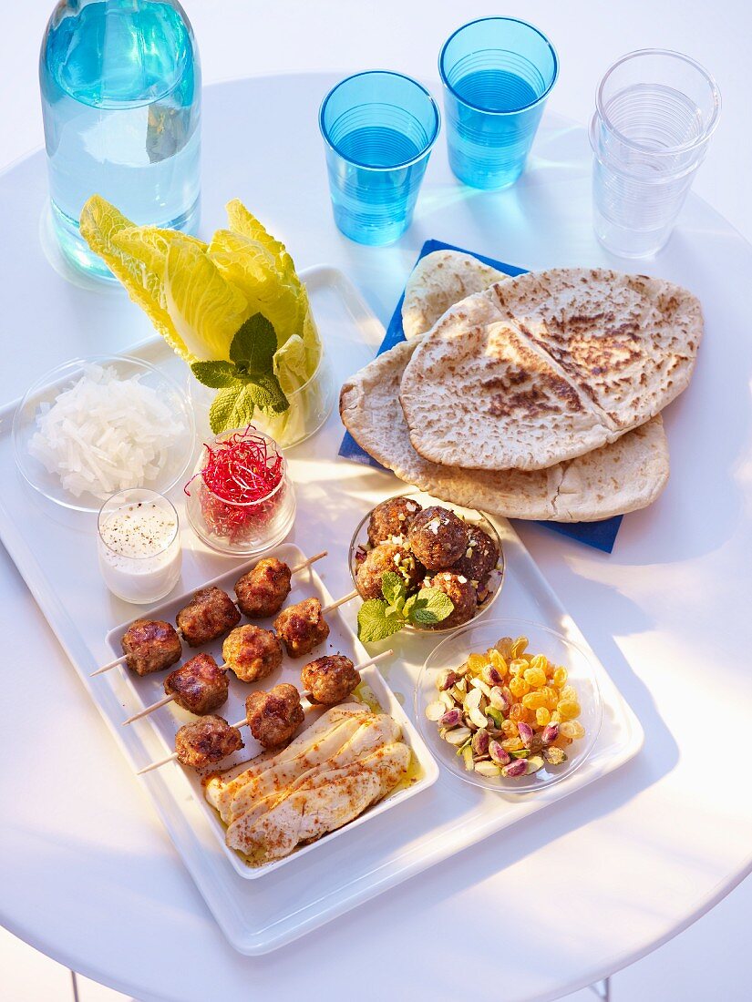Falafel, pita bread, kebabs and salad