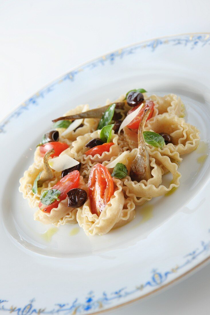 Tagliatelle with sword fish, tomatoes, olives and basil