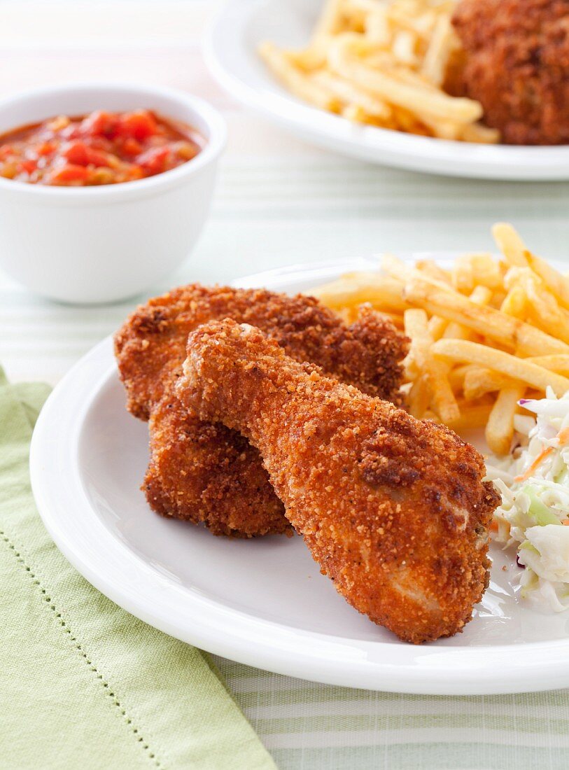Fried Chicken with French Fries and Cole Slaw on a Plate