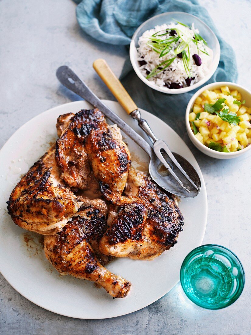 Caribbean jerk chicken with coconut rice and pineapple relish
