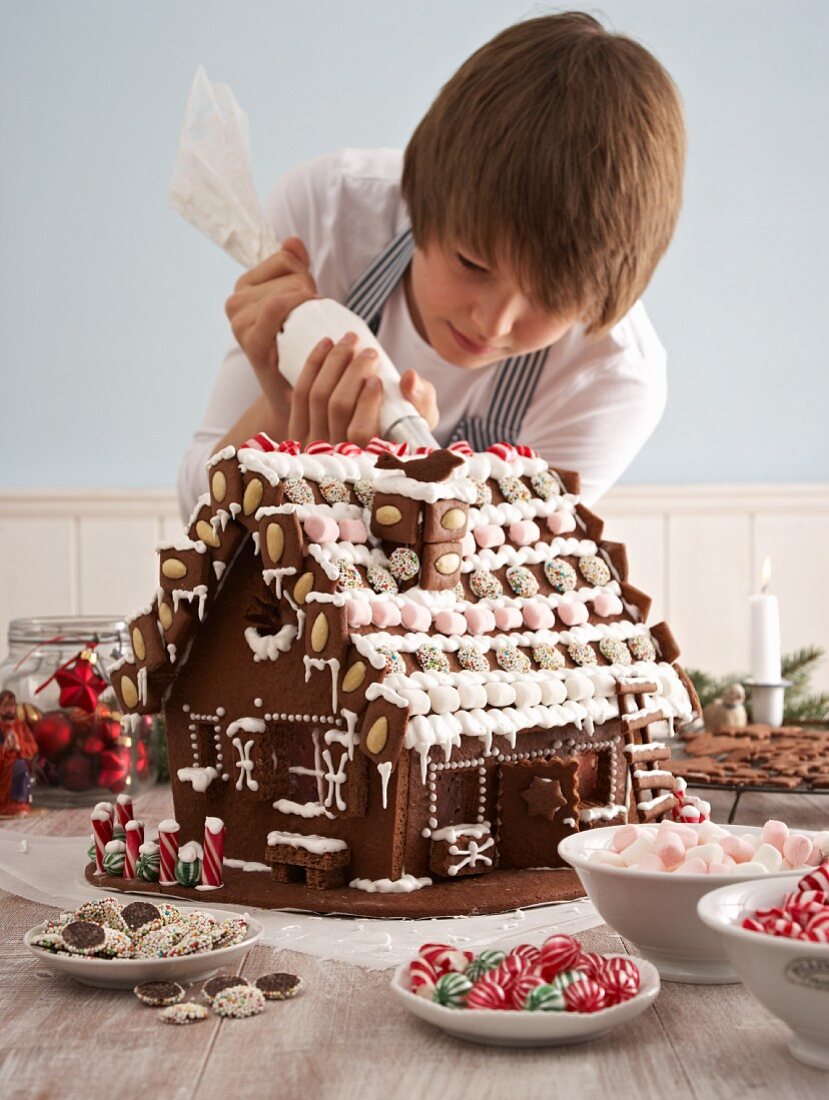 Decorating a gingerbread house