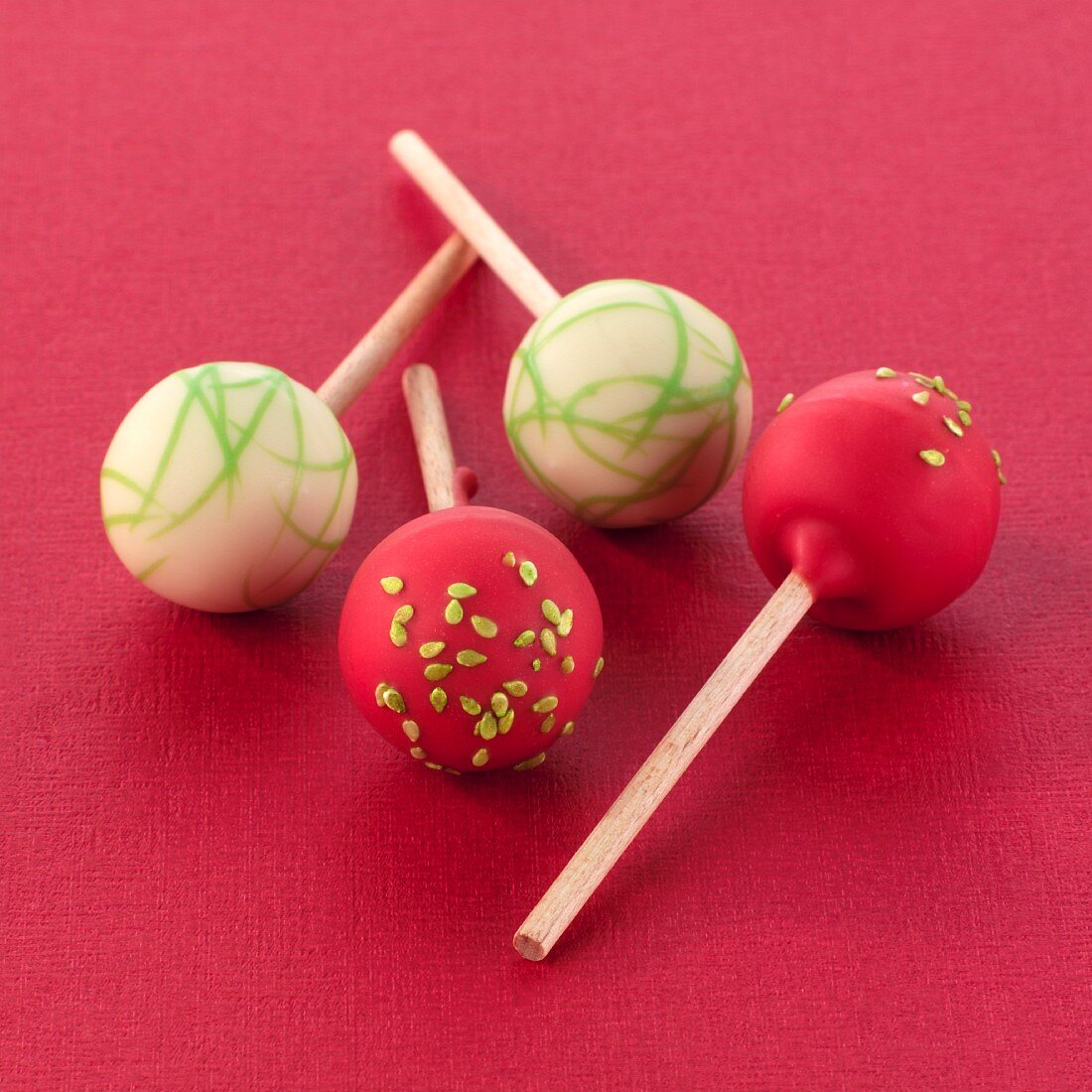 Assorted cake pops (red background)