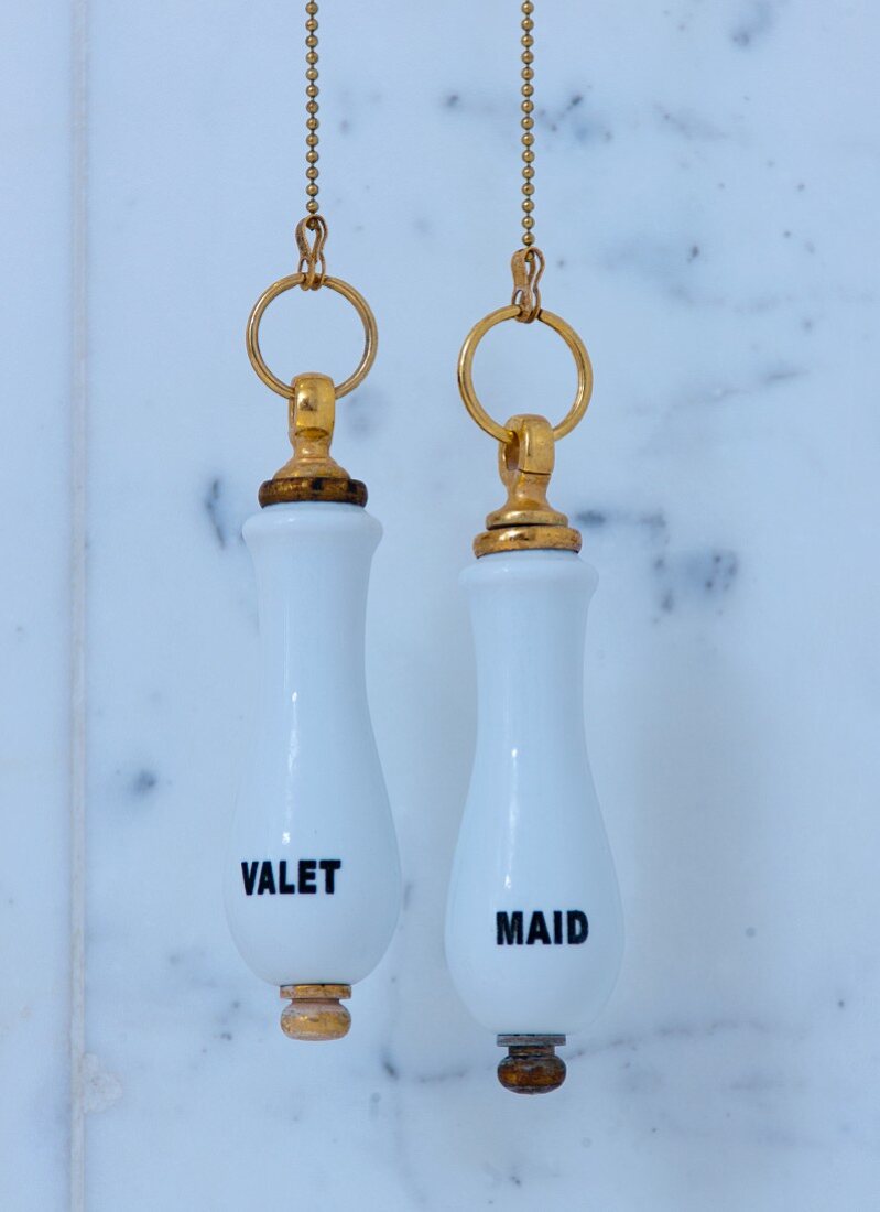 Bell pulls for valet and maid in luxury hotel