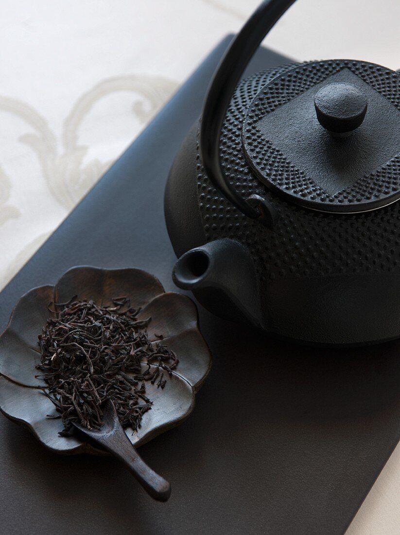 Tea leaves and a Chinese teapot