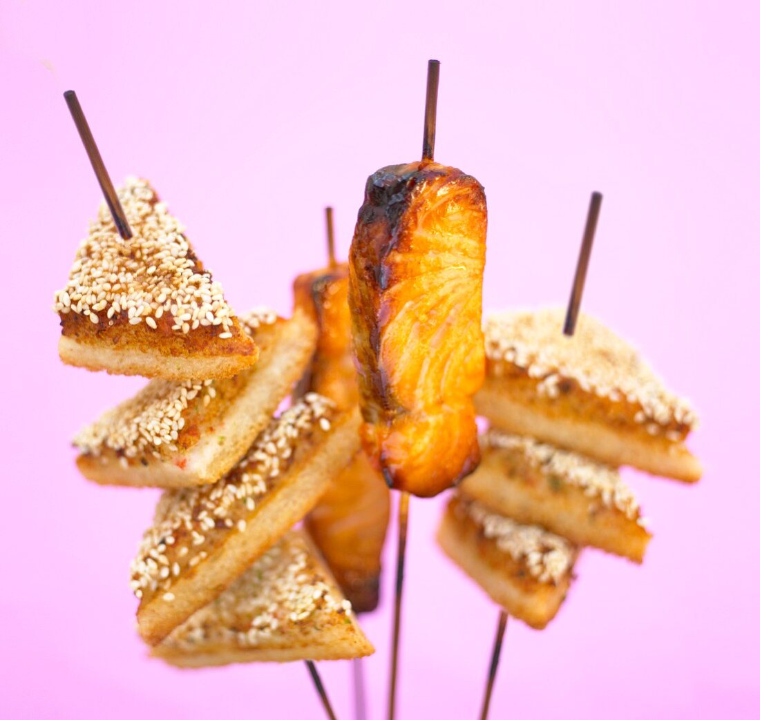 Grilled salmon and sesame toast on skewers