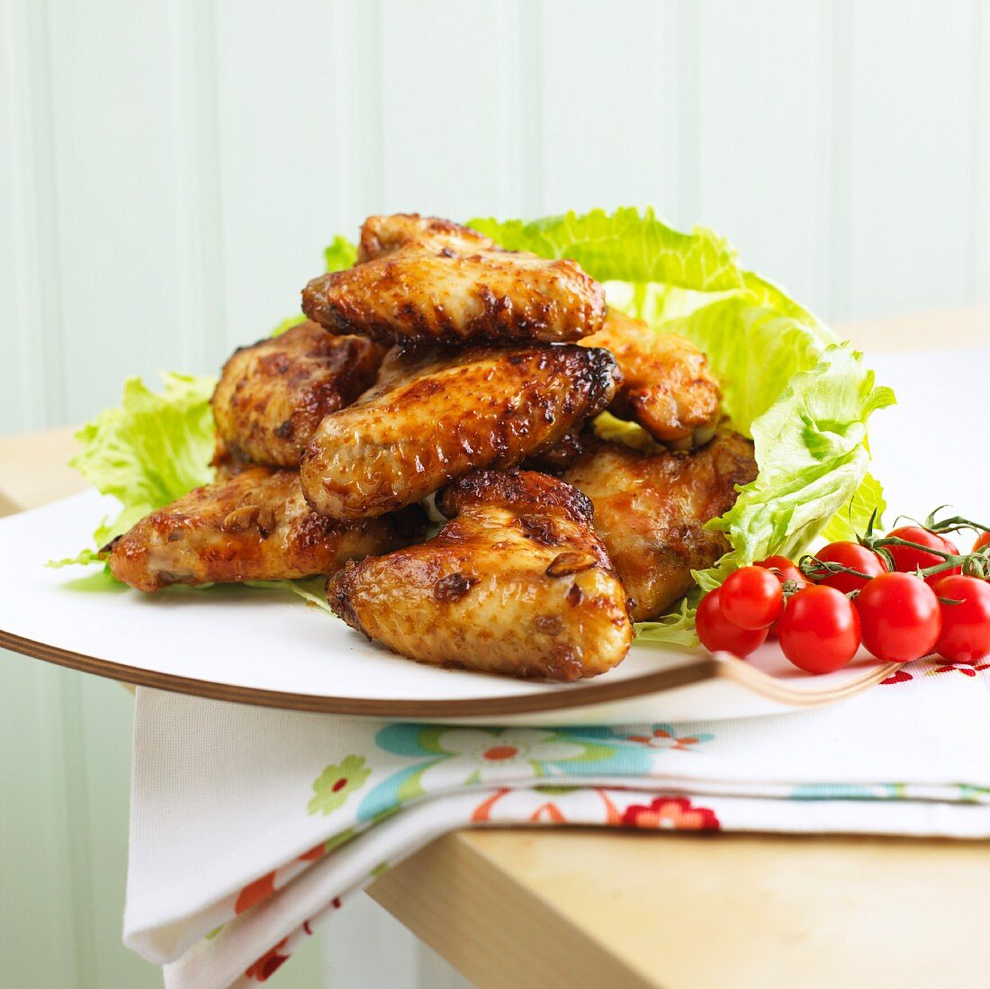 Chicken wings glazed with soy sauce