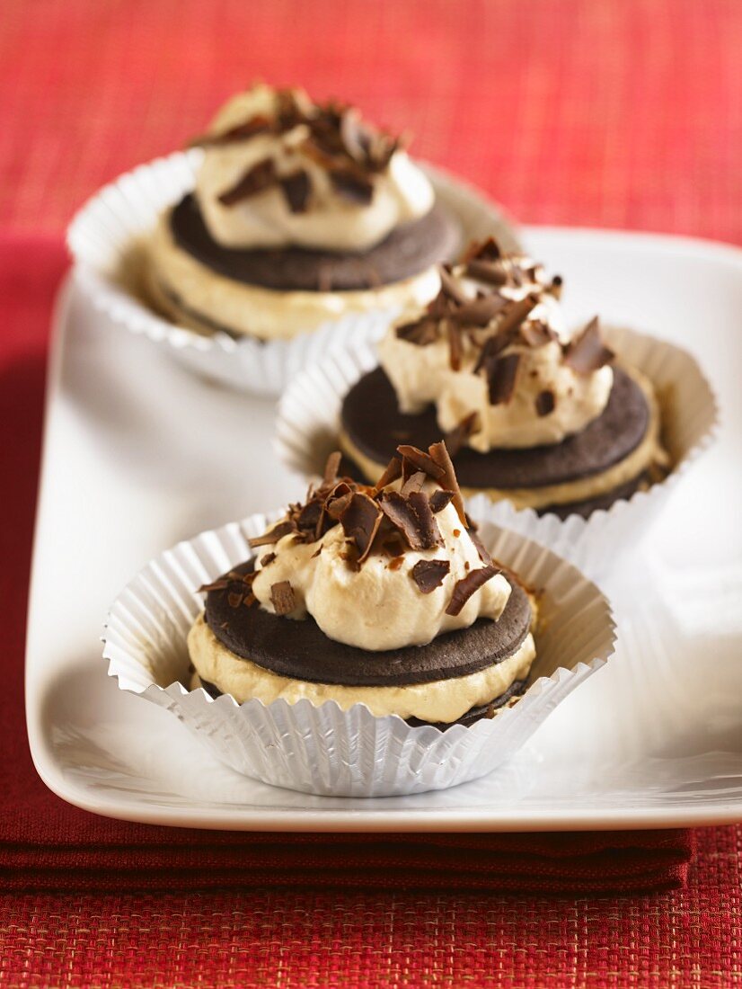 Three Cream Filled Chocolate Cookies with Chocolate Shavings; In Muffin Cups