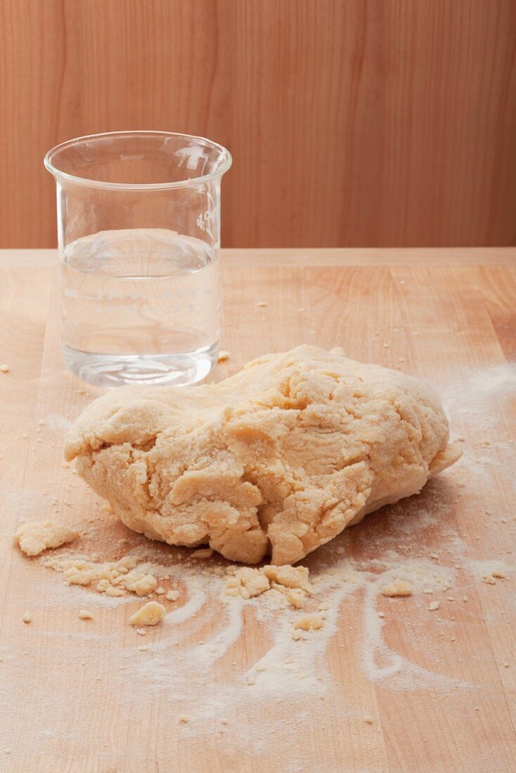 Pasta dough on a wooden surface